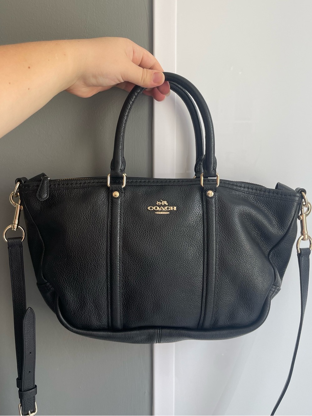 52. Black coach purse